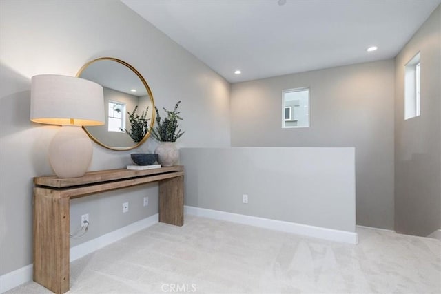 interior space featuring recessed lighting and baseboards