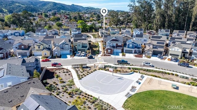 birds eye view of property featuring a residential view and a mountain view