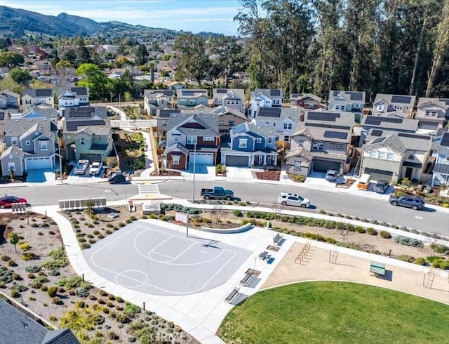 birds eye view of property with a residential view and a mountain view