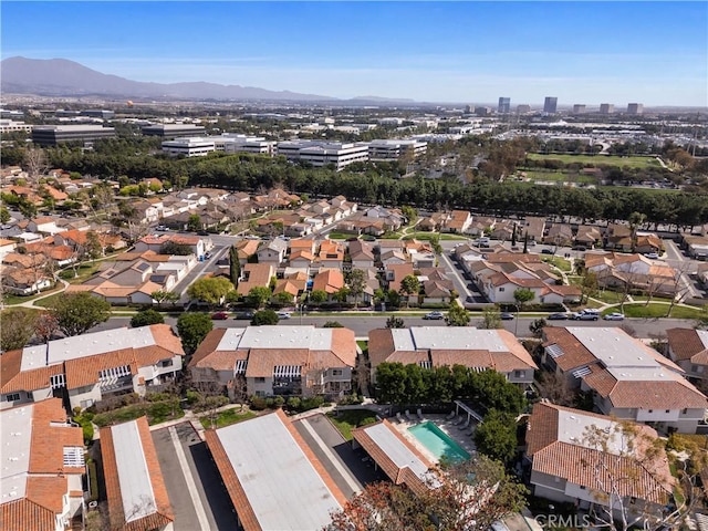 drone / aerial view with a residential view and a mountain view