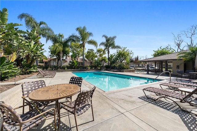 pool with a patio area