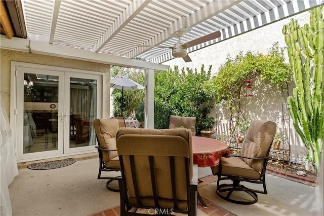 view of patio featuring a pergola and french doors