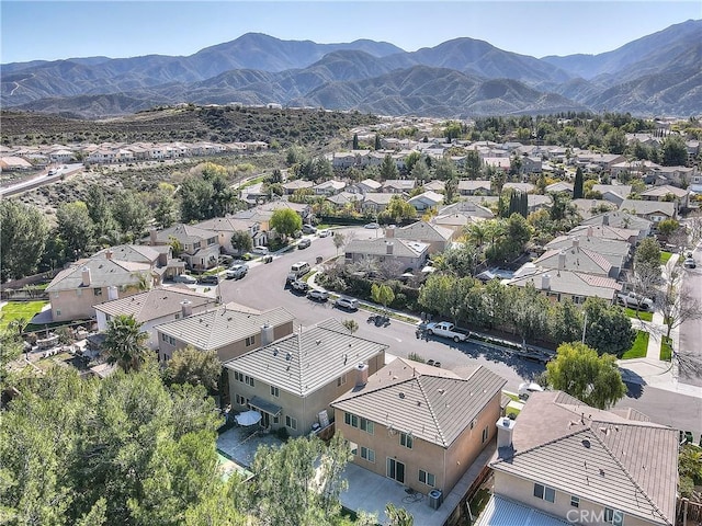 birds eye view of property with a residential view and a mountain view