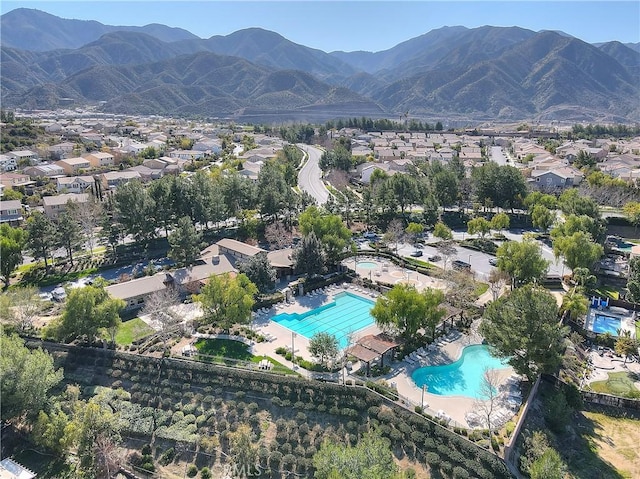 birds eye view of property featuring a residential view and a mountain view