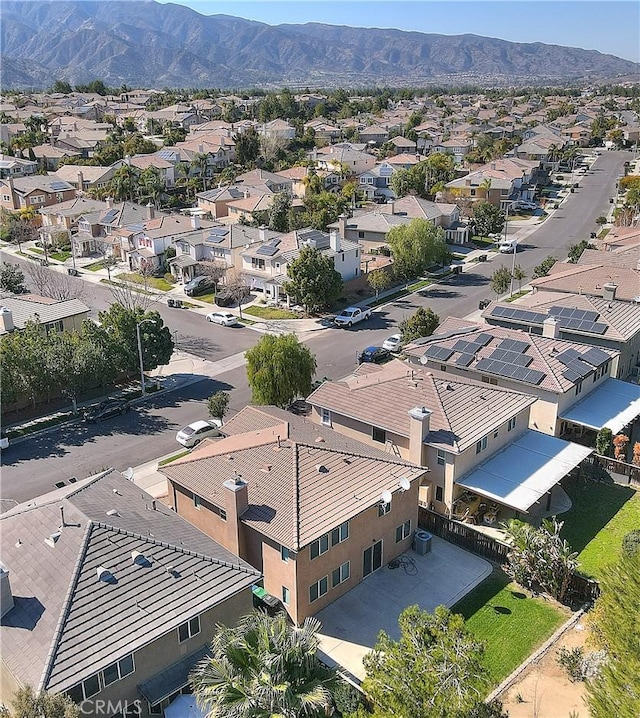 bird's eye view featuring a mountain view and a residential view