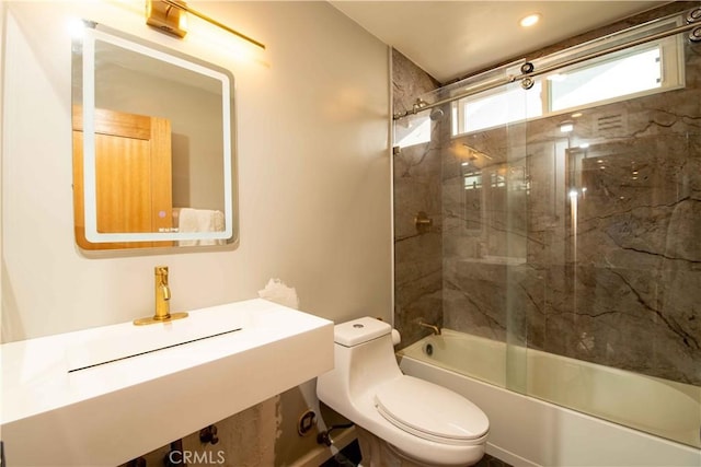 full bath with toilet and enclosed tub / shower combo