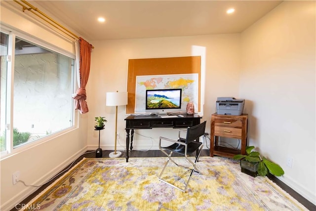 office featuring recessed lighting, wood finished floors, and baseboards