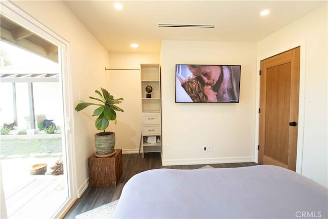 bedroom featuring dark wood-style floors, baseboards, visible vents, and recessed lighting