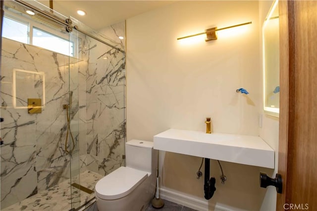 full bathroom featuring toilet and a marble finish shower