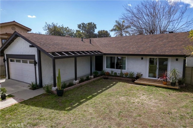 view of front of house with a garage, a shingled roof, driveway, stucco siding, and a front lawn