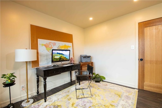 home office featuring recessed lighting, baseboards, and wood finished floors