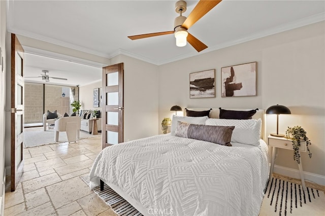 bedroom featuring crown molding, baseboards, ceiling fan, and stone tile flooring