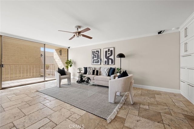 living area featuring floor to ceiling windows, crown molding, stone tile flooring, a ceiling fan, and baseboards