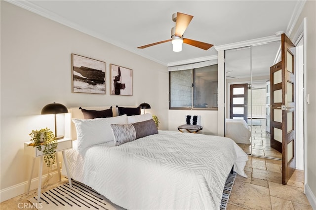 bedroom with crown molding, baseboards, and stone tile floors