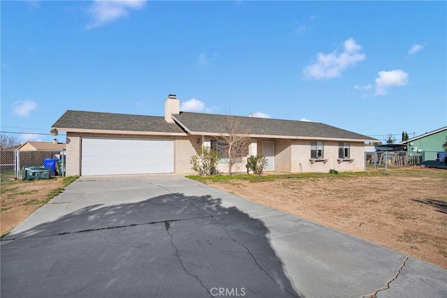 single story home with a garage, concrete driveway, a chimney, fence, and stucco siding