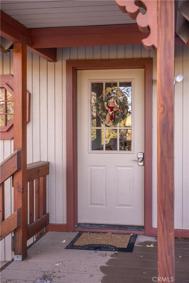 property entrance with board and batten siding