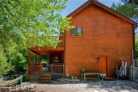 back of house featuring a patio