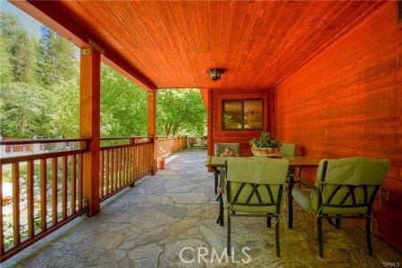 view of patio with outdoor dining area