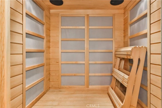 storage room with a sauna