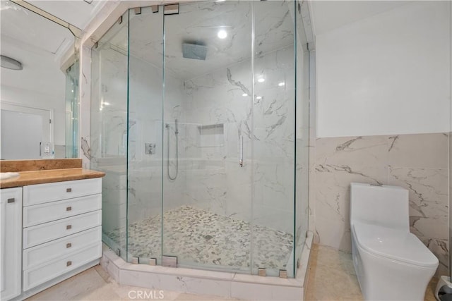 full bathroom with tile walls, toilet, vanity, and a marble finish shower