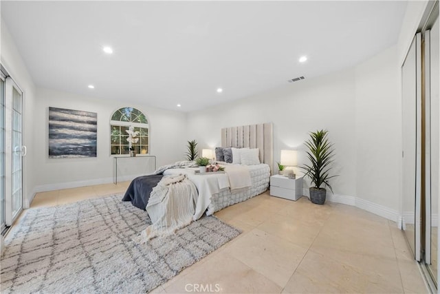 bedroom with recessed lighting, a closet, visible vents, and baseboards