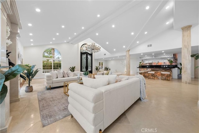 living area with visible vents, beamed ceiling, ornate columns, high vaulted ceiling, and recessed lighting