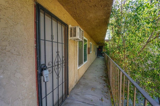 balcony with a wall mounted air conditioner