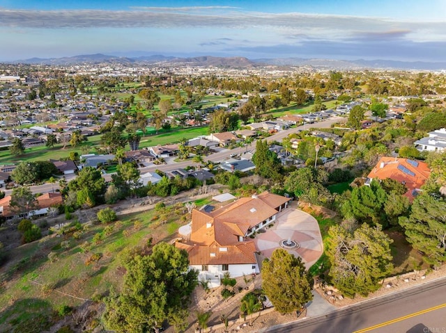 birds eye view of property featuring a mountain view and a residential view