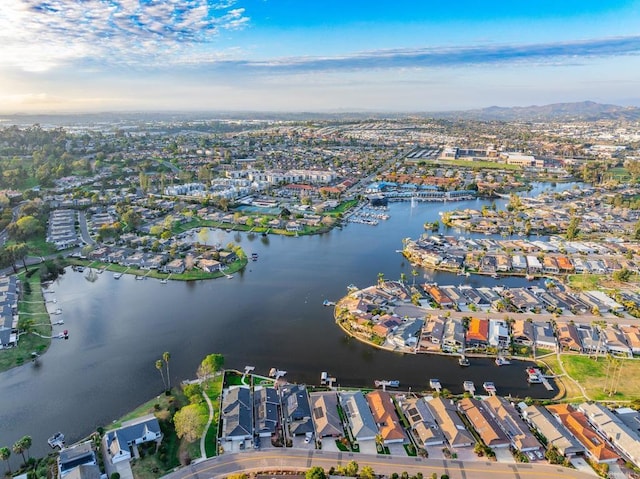 bird's eye view with a residential view and a water view