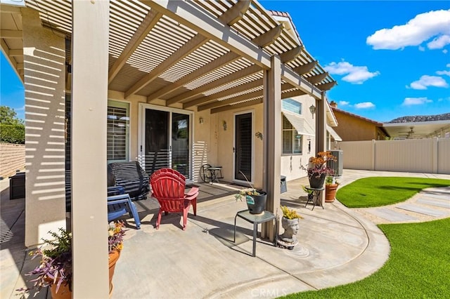 view of patio / terrace featuring central air condition unit, fence, and a pergola