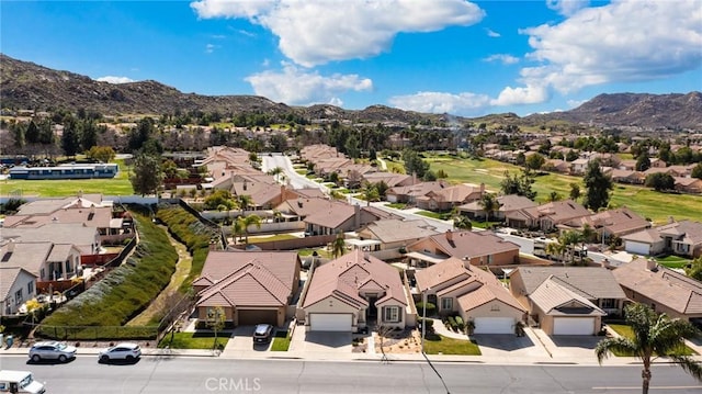 bird's eye view featuring a residential view and a mountain view