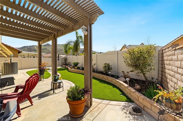 view of patio with central AC, a fenced backyard, and a pergola