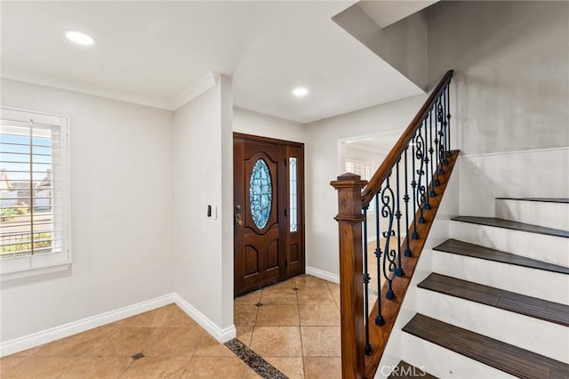 entryway featuring recessed lighting, baseboards, ornamental molding, stairway, and tile patterned floors