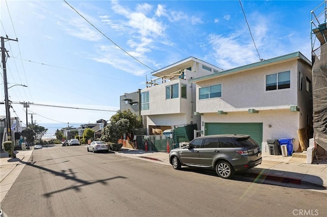 view of front of house featuring stucco siding