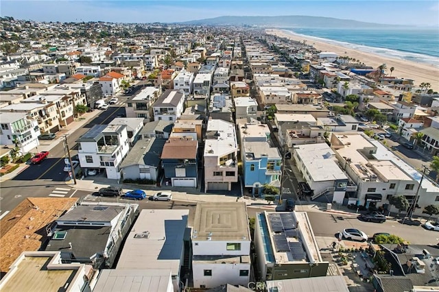 aerial view featuring a water view and a view of the beach