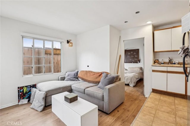 living room featuring recessed lighting and light wood finished floors