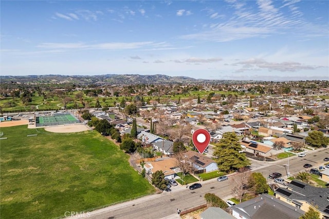 birds eye view of property featuring a residential view and a mountain view