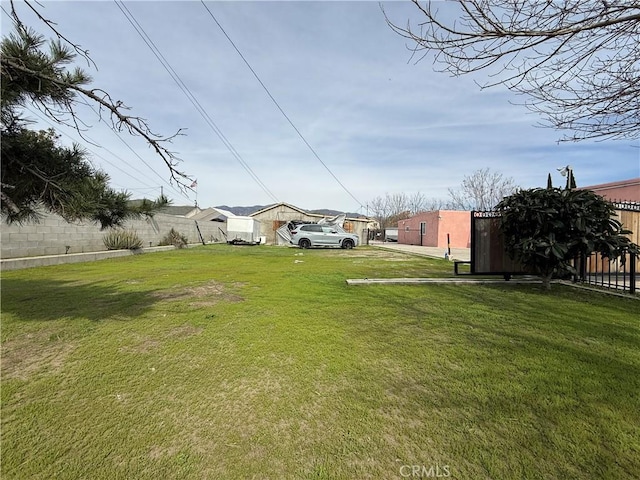 view of yard with fence