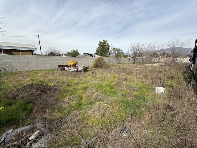 view of yard with fence