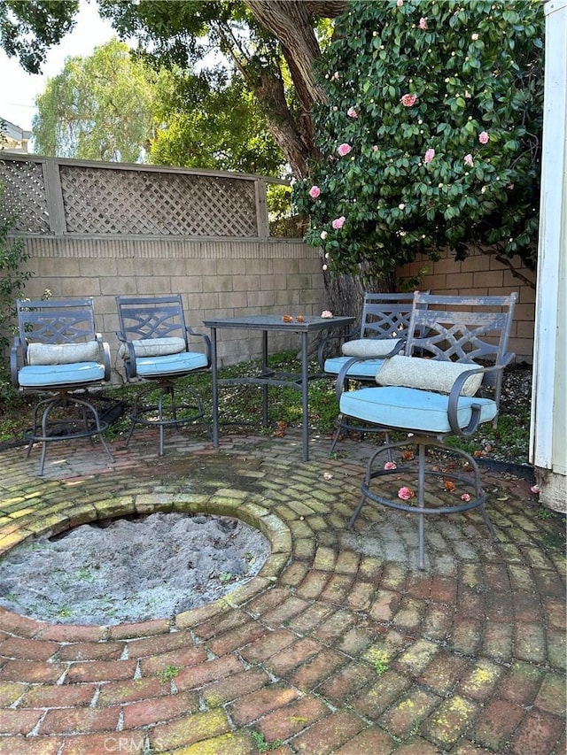 view of yard featuring a patio and fence