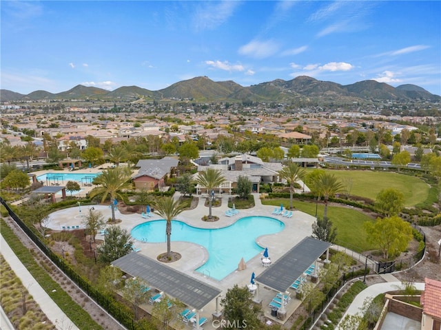 pool featuring a residential view and a mountain view