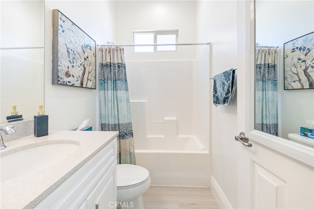 full bath featuring toilet, wood finished floors, shower / bath combination with curtain, and vanity