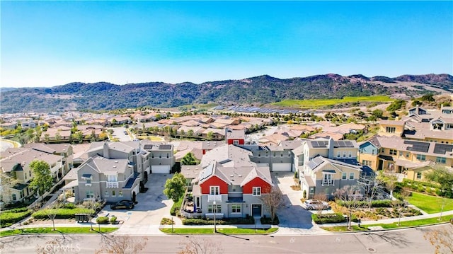 birds eye view of property featuring a residential view and a mountain view