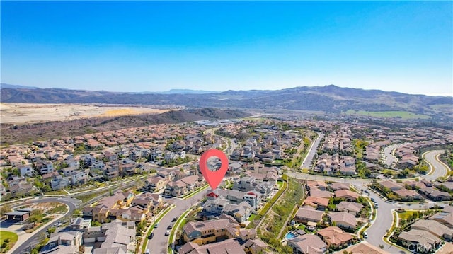 aerial view featuring a residential view and a mountain view