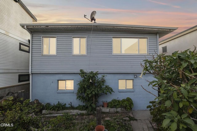 view of property exterior at dusk