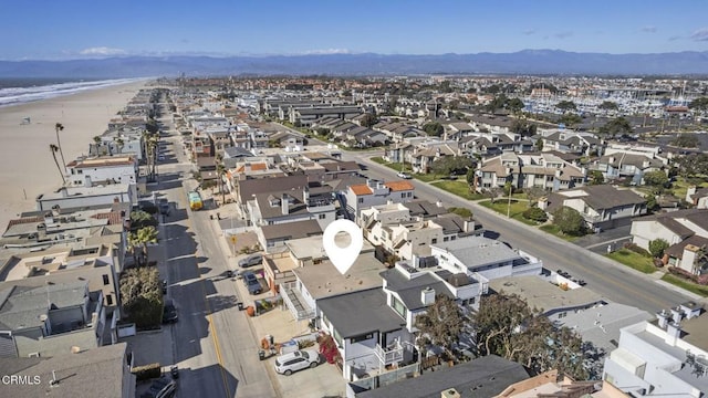 aerial view featuring a residential view and a mountain view