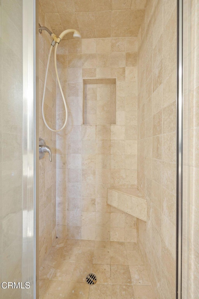 room details featuring a shower stall