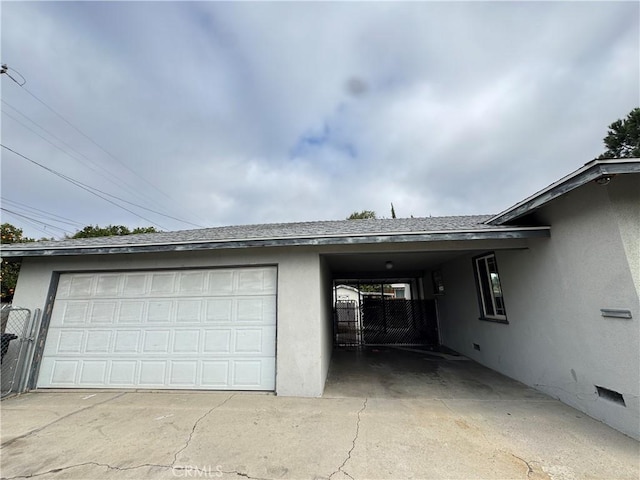 garage with fence