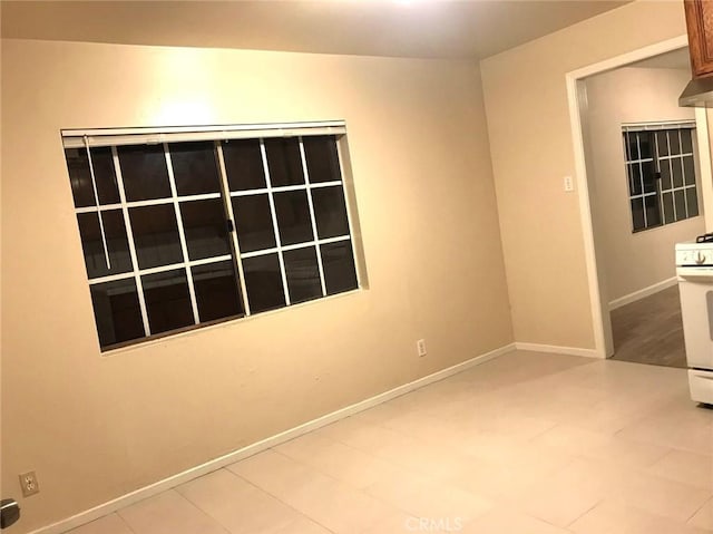 empty room with baseboards