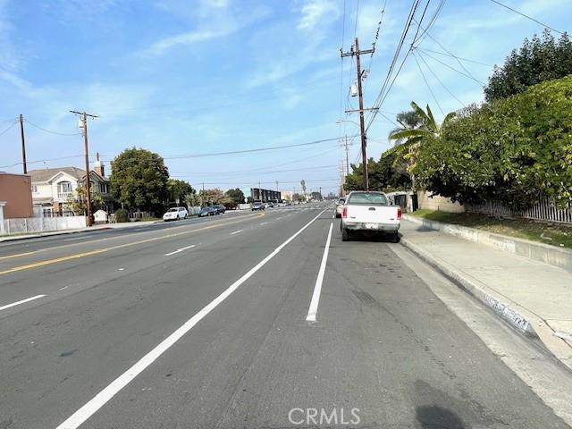 view of street featuring curbs and sidewalks